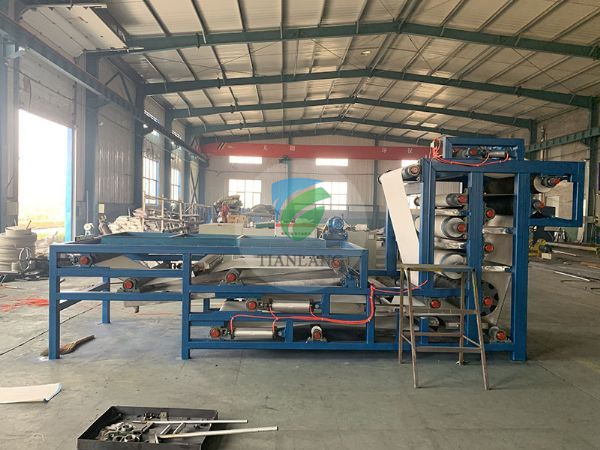 Washing belt filter press